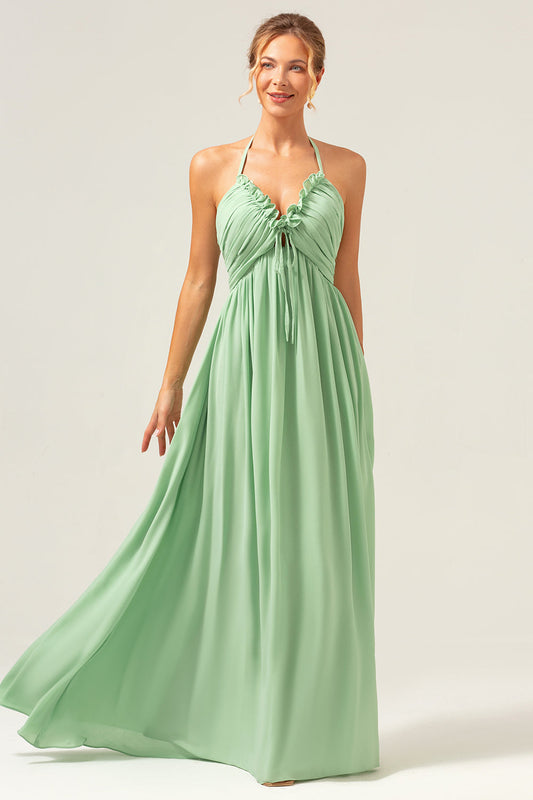 Robe de demoiselle d'honneur longue vert clair évasée avec dos nu licou et laçage au dos