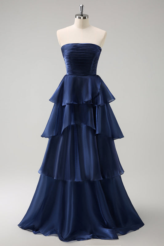 Robe longue de demoiselle d'honneur trapèze bustier à volants en satin bleu marine foncé