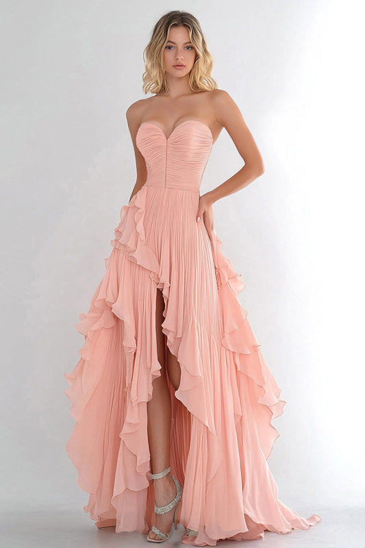 Robe de bal longue en mousseline rose coupe trapèze à volants