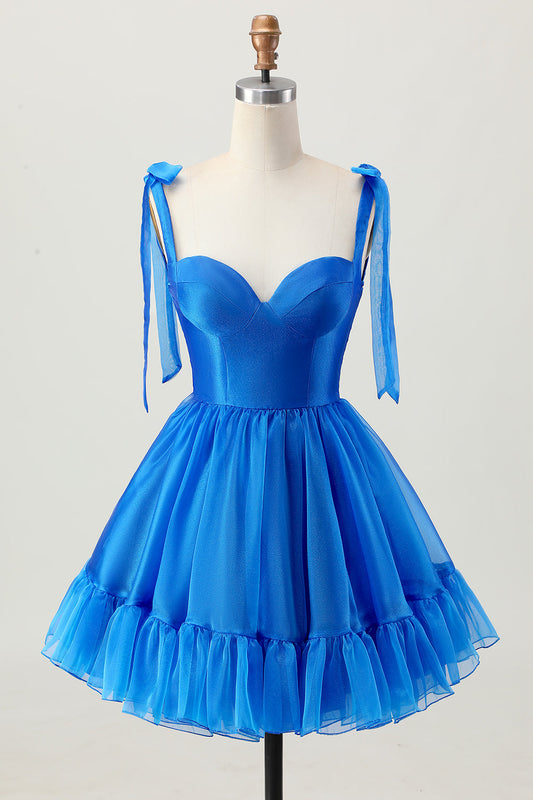 Robe de cocktail bleu roi trapèze à fines bretelles et volants