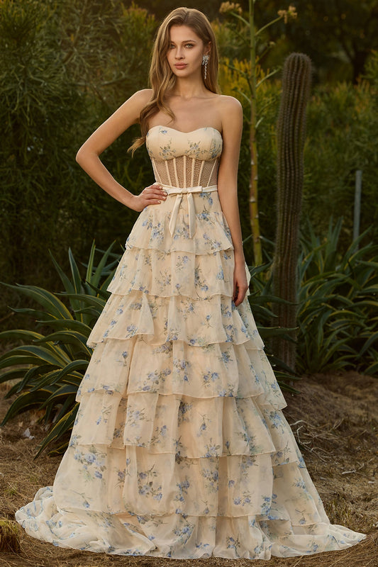 Robe de bal longue sans bretelles trapèze jaune à fleurs perlée corsetée avec volants