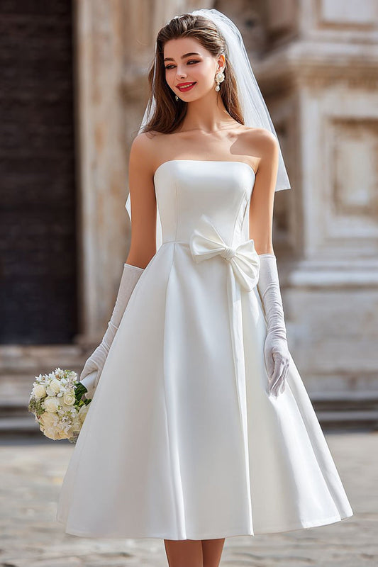 Robe de mariée midi blanche bustier coupe trapèze avec nœud (sans gants)