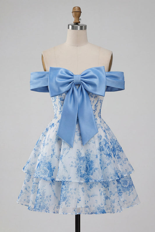 Robe de bal bleu trapèze, épaules dénudées, à motif floral et nœud