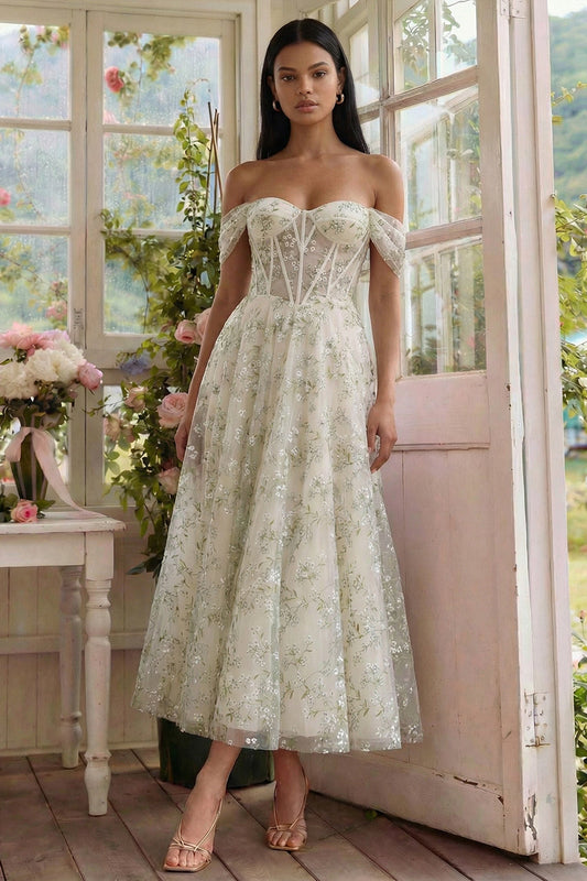 Robe midi en tulle ligne A vert clair avec corset, épaules dénudées et appliques