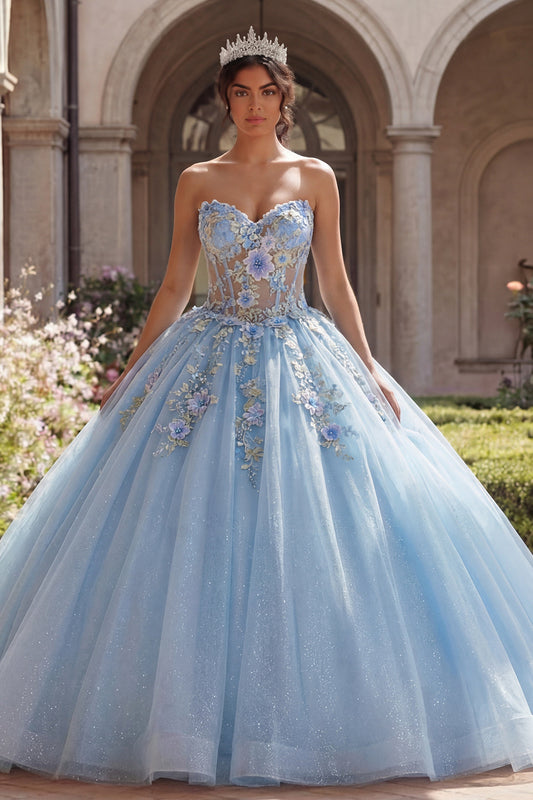 Vestido de quinceañera con corpiño sin tirantes azul y apliques