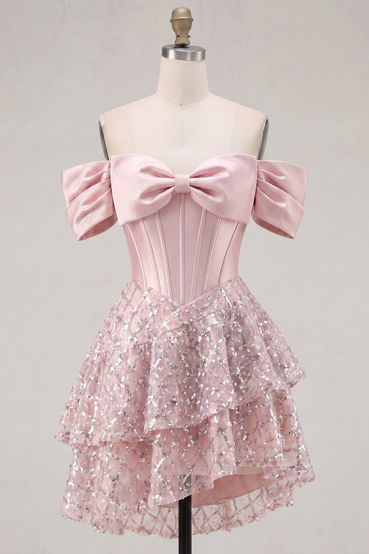 Robe de bal courte en satin blush à corsage agrémenté de sequins, avec nœud et épaules dénudées