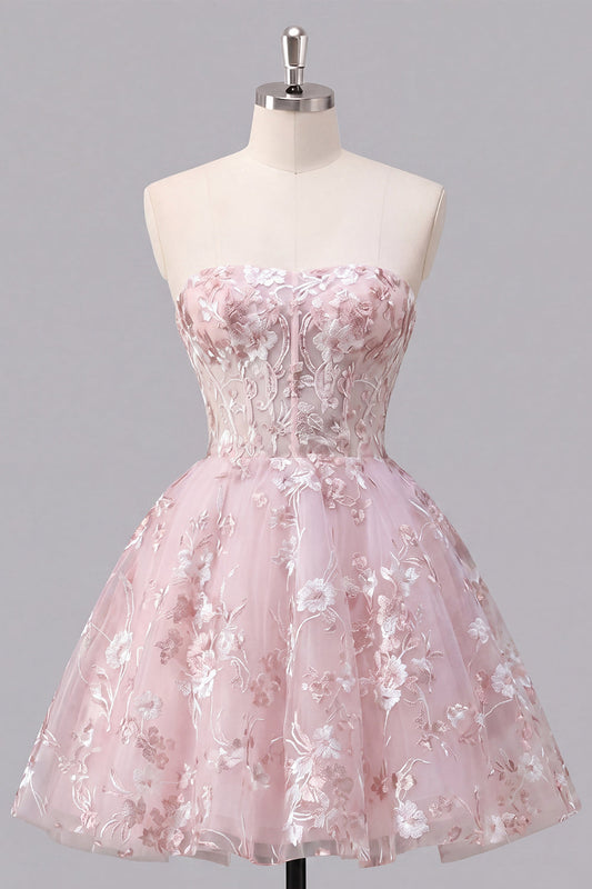 Robe de bal bustier rose évasée avec corset et motifs floraux