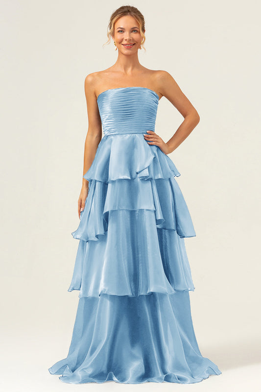 Robe de bal longue en satin bleu ligne A sans bretelles à volants
