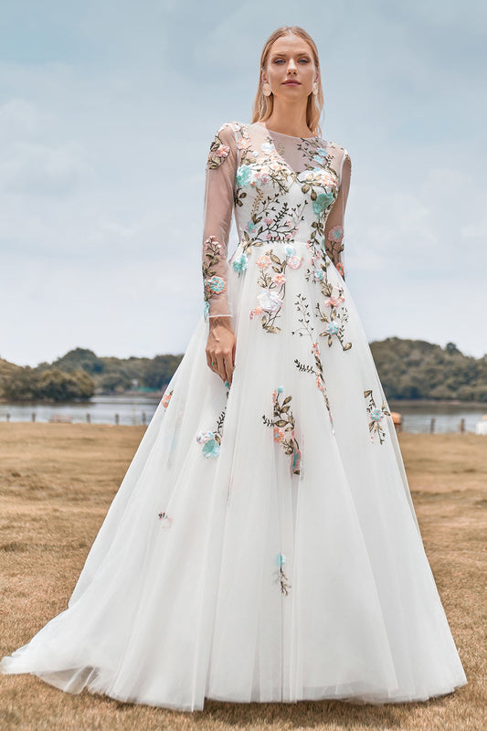 Magnifique robe de mariée longue ivoire en tulle à manches longues et coupe trapèze avec broderies