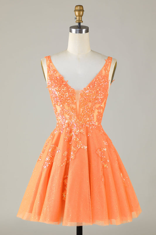 Robe de soirée orange pailletée trapèze à sequins