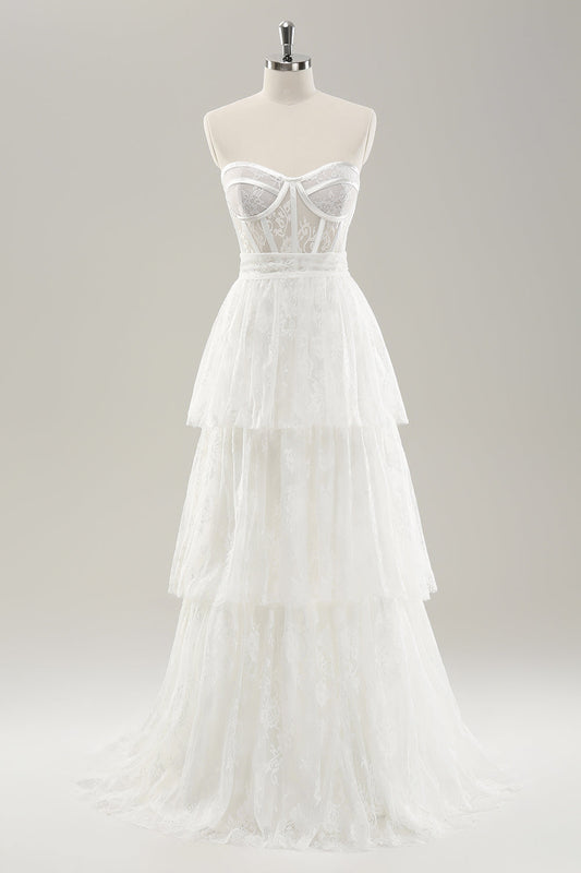 Robe de mariée longue bustier blanche à volants