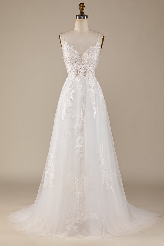 Robe de mariée ivoire trapèze en tulle avec bretelles croisées dans le dos