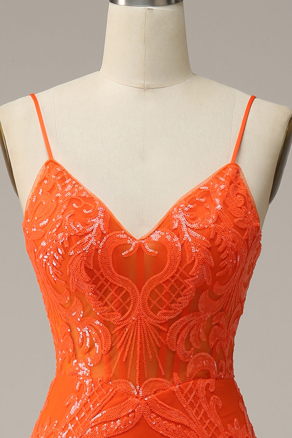 Robe de soirée longue orange sirène à bretelles spaghetti et fente sur le devant