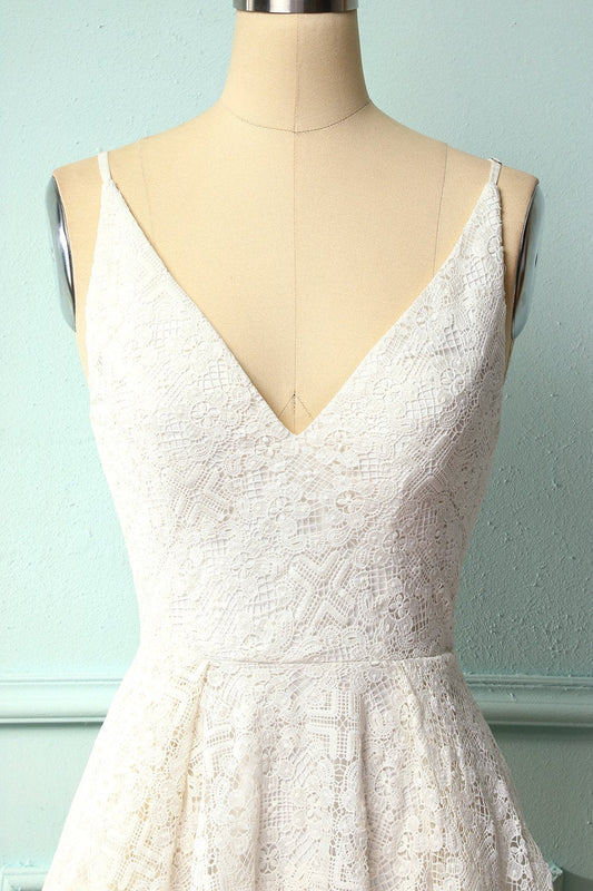 Robe asymétrique en dentelle blanche