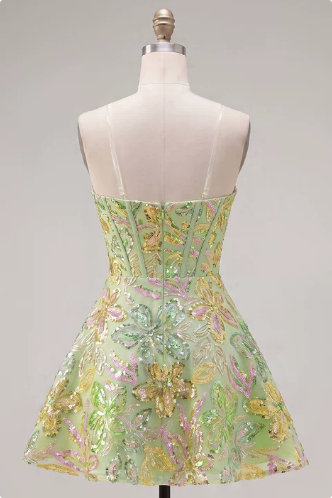 Robe courte de cocktail trapèze verte à corset et paillettes