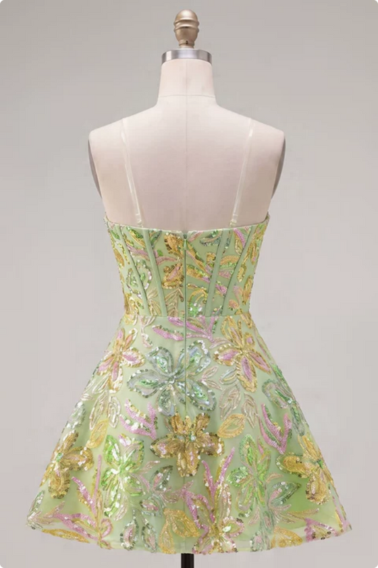 Robe courte de cocktail trapèze verte à corset et paillettes