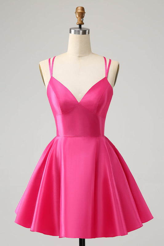 Robe de bal courte fuchsia avec bretelles fines, dos nu et coupe trapèze