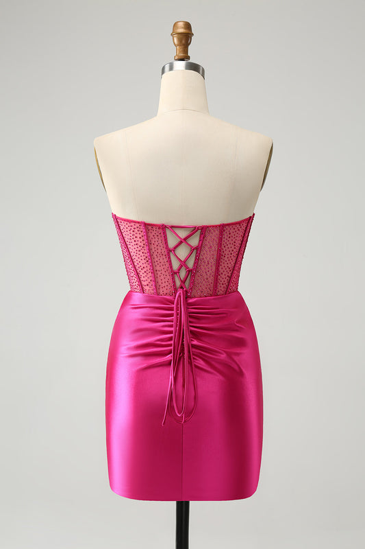 Robe de bal bustier, fuchsia étincelant, ajustée et ornée de perles