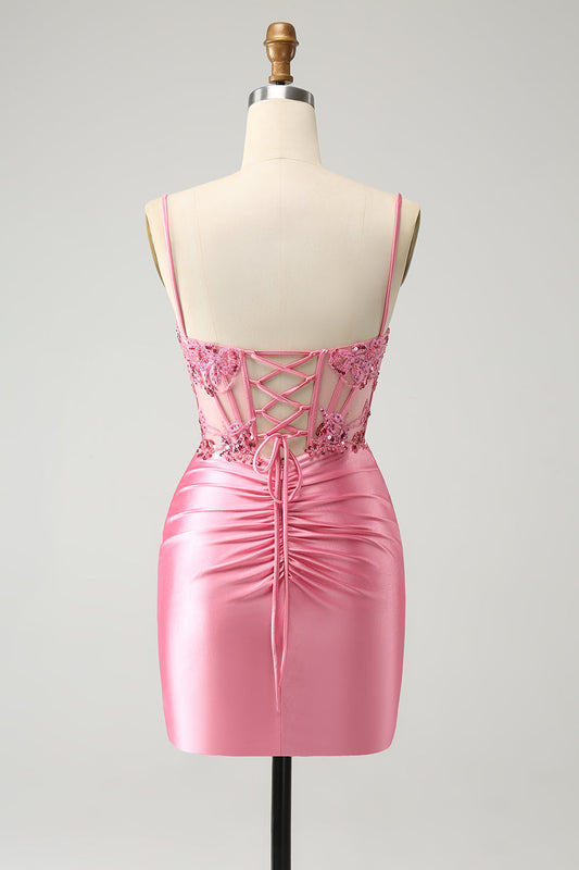Robe de bal rose vif moulante à corset, bretelles spaghetti et appliques