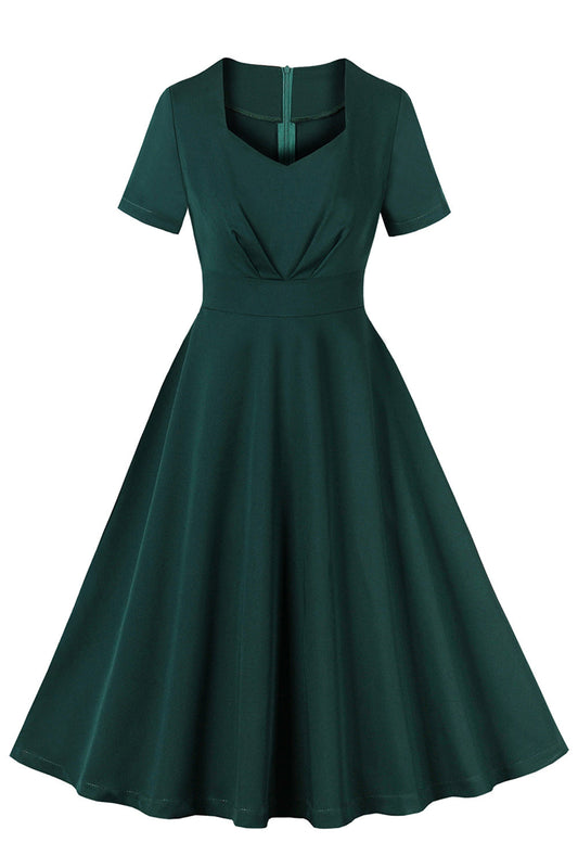 Robe verte foncée à volants et manches courtes, style années 50