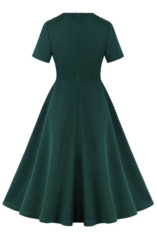 Robe verte foncée à volants et manches courtes, style années 50