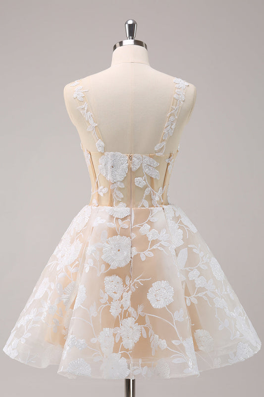 Robe de soirée courte corselet évasée fleurie blanche scintillante