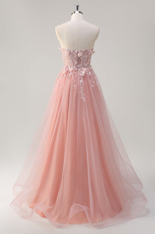 Robe de bal longue en tulle bustier coupe trapèze avec fleurs et fente rose étincelant
