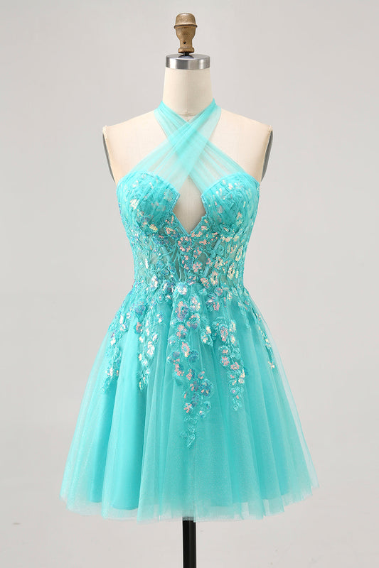 Robe de cocktail courte vert anis trapèze à licou avec applications