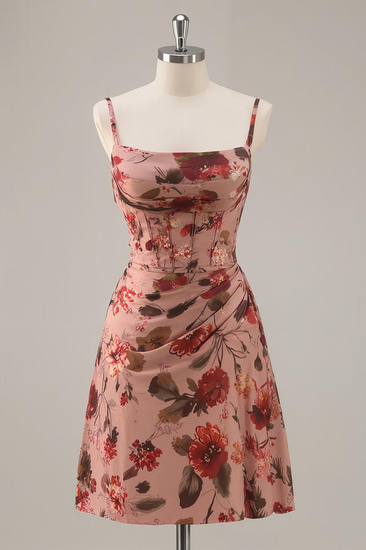 Robe de cocktail corset évasée rose poudré imprimée