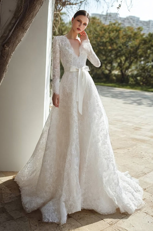Robe de mariée ivoire en dentelle à col en V et manches longues avec ceinture