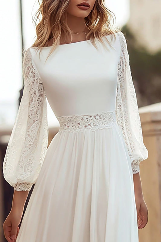 Robe de mariée en dentelle évasée ivoire à manches longues et à fente