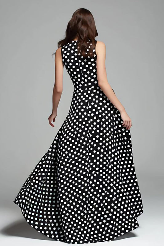 Robe longue formelle noire et blanche à pois, col rond, coupe trapèze, avec poches