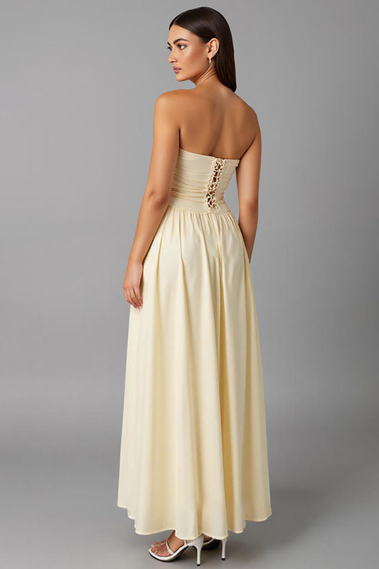 Robe de soirée bustier trapèze en mousseline simple jonquille