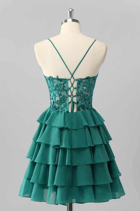 Robe de cocktail trapèze à volants en sequins vert foncé avec appliques