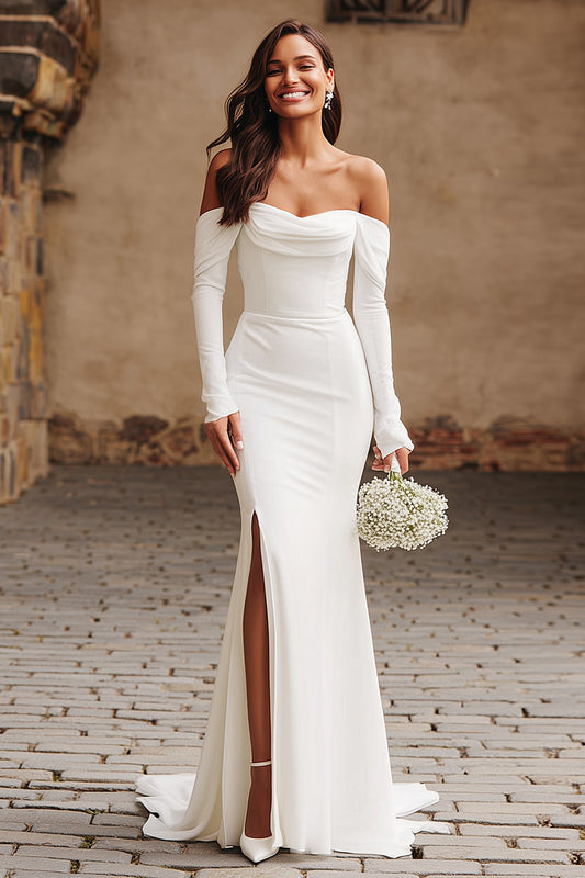 Robe de mariée sirène ivoire à épaules dénudées, manches longues et fente