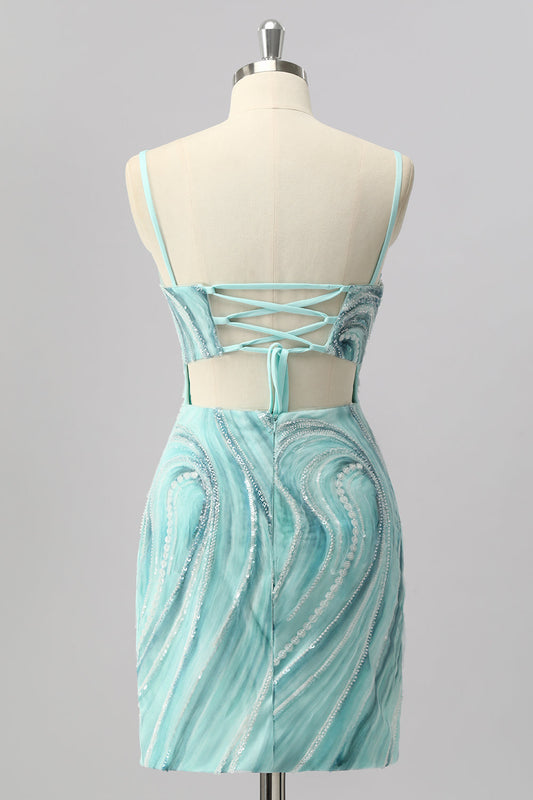 Robe de cocktail mini fourreau verte à paillettes et perles