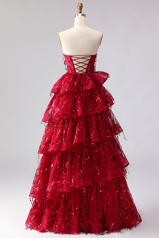 Robe de bal longue Princesse Scintillante Bordeaux avec bustier en cœur, franges et sequins à volants