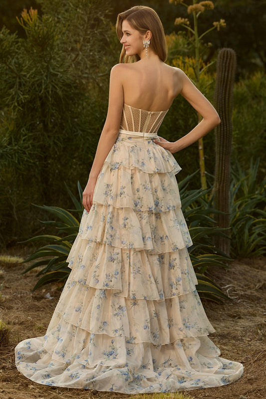 Robe de bal longue sans bretelles trapèze jaune à fleurs perlée corsetée avec volants