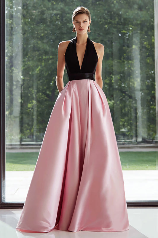 Robe longue de soirée trapèze noire et rose en satin avec décolleté halter et poches