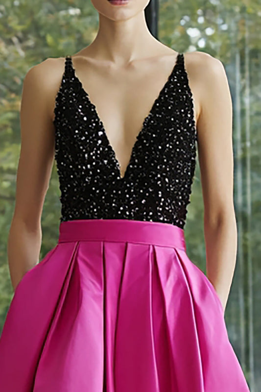 Robe de soirée longue trapèze en satin noir et fuchsia scintillant avec décolleté en V profond et poches