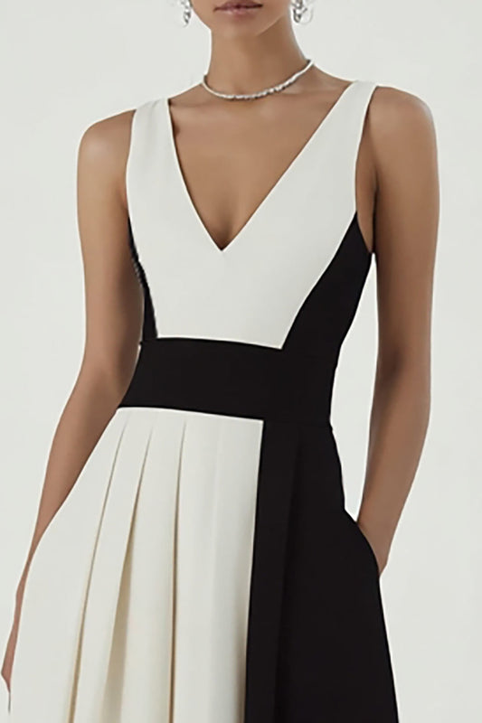 Robe longue de soirée trapèze avec col en V et patchwork noir et blanc, avec poches