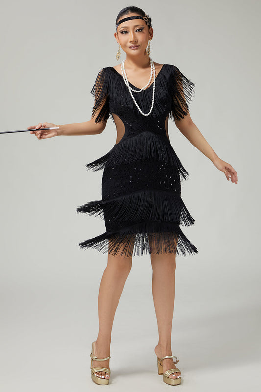 Robe des années 20 noire en V à volants frangée découpée à paillettes