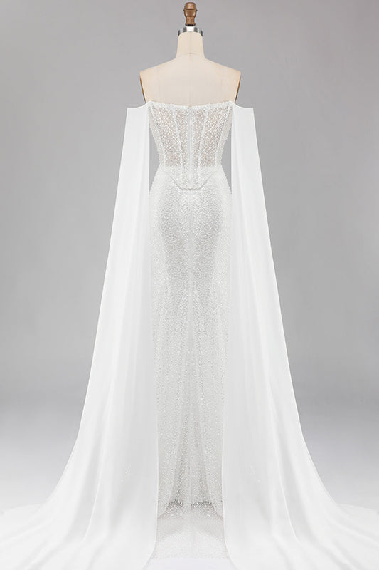 Robe longue de bal blanche avec perles, col bustier, sequins et cape