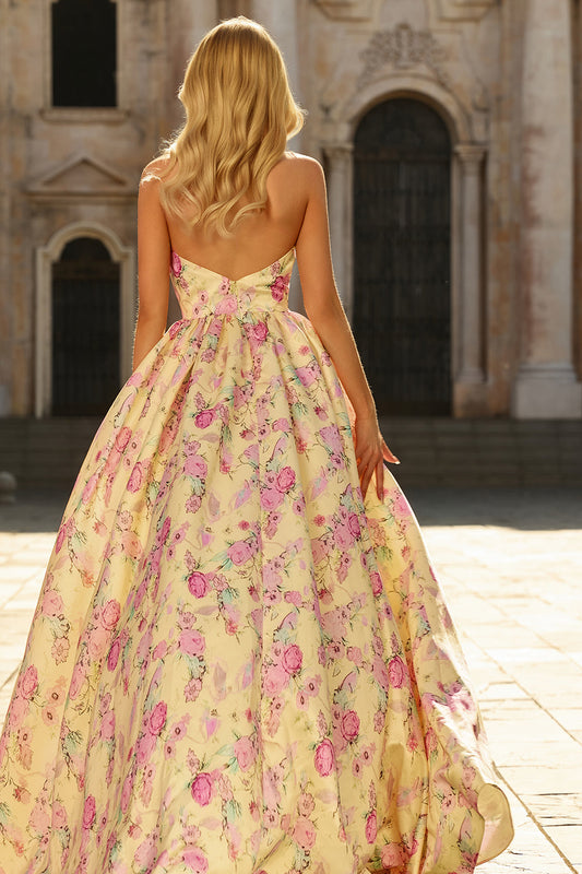 Robe de bal longue fendue à fleurs jaunes et roses, décolleté en V profond et dos nu, coupe trapèze