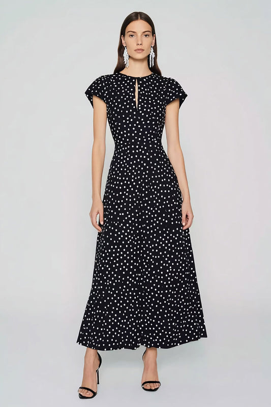 Robe trapèze col rond longue noire à pois blancs