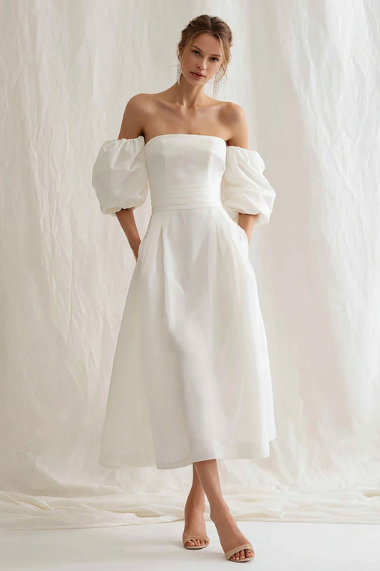 Vestido de novia largo tipo A sin hombros en color marfil