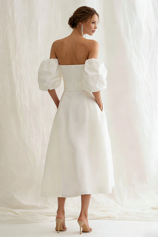 Vestido de novia largo tipo A sin hombros en color marfil