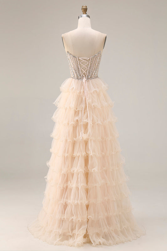 Robe de bal longue abricot sans bretelles à étages, ligne A, paillettes et perles avec fente
