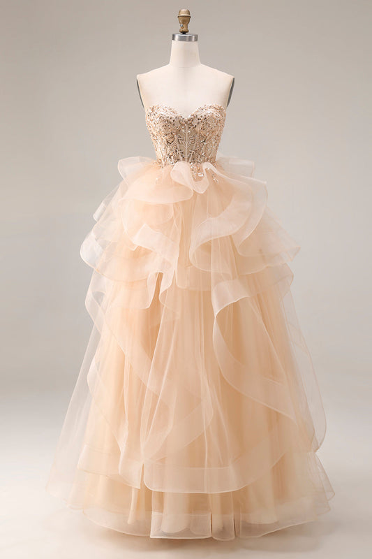 Robe de bal longue en organza ligne A sans bretelles champagne avec volants