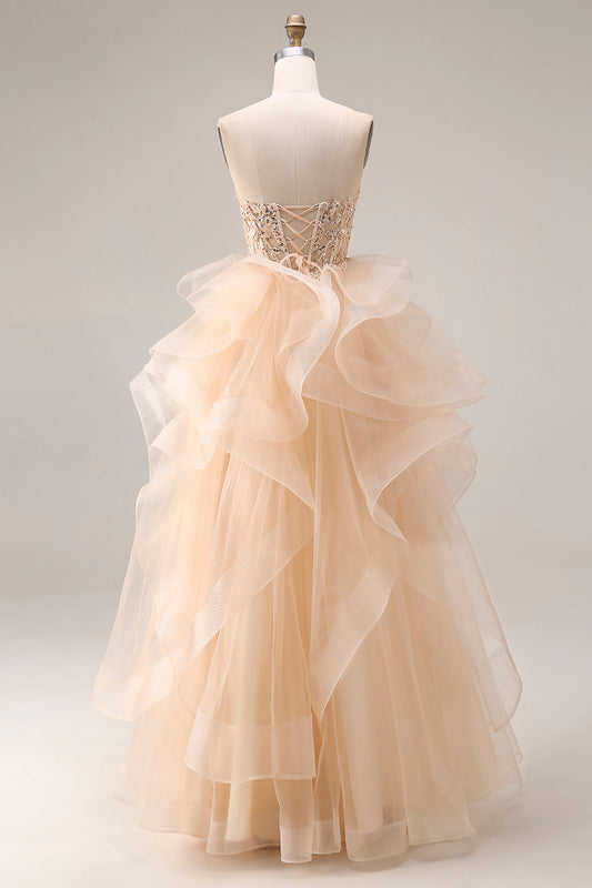 Robe de bal longue en organza ligne A sans bretelles champagne avec volants